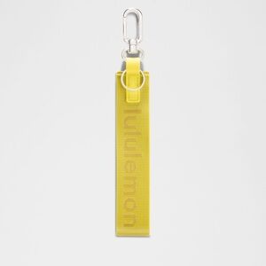 Lululemon | never lost keychain | daisy glow